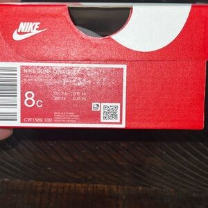 Nike Black and White Sole Sneakers